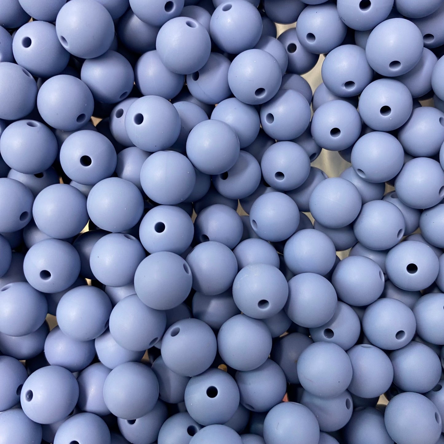 a 63 / 15mm - Bernera Blue Silicone Bead
