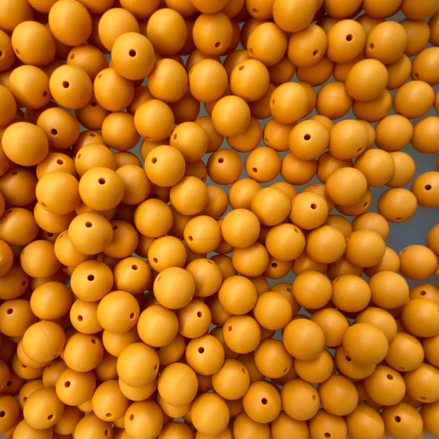 a 27 / 15mm - Mango Silicone Bead