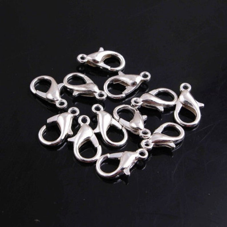 P72 - Silver Lobster Clasps Size: 12mm x 6mm (10 Count)