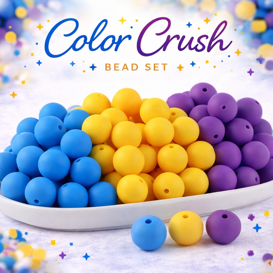 Color Crush bead set with blue, yellow, and purple beads on a white plate against a colorful background.
