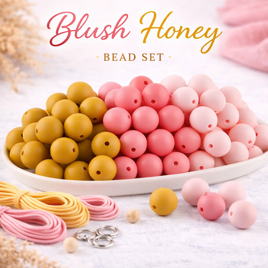 Bead set with yellow and pink beads on a white surface, branded 'Blush Honey'.