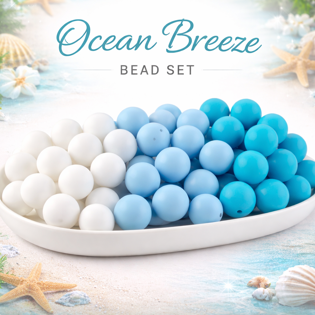 Bead set with blue and white beads on a plate, labeled 'Ocean Breeze', with beach-themed decor.