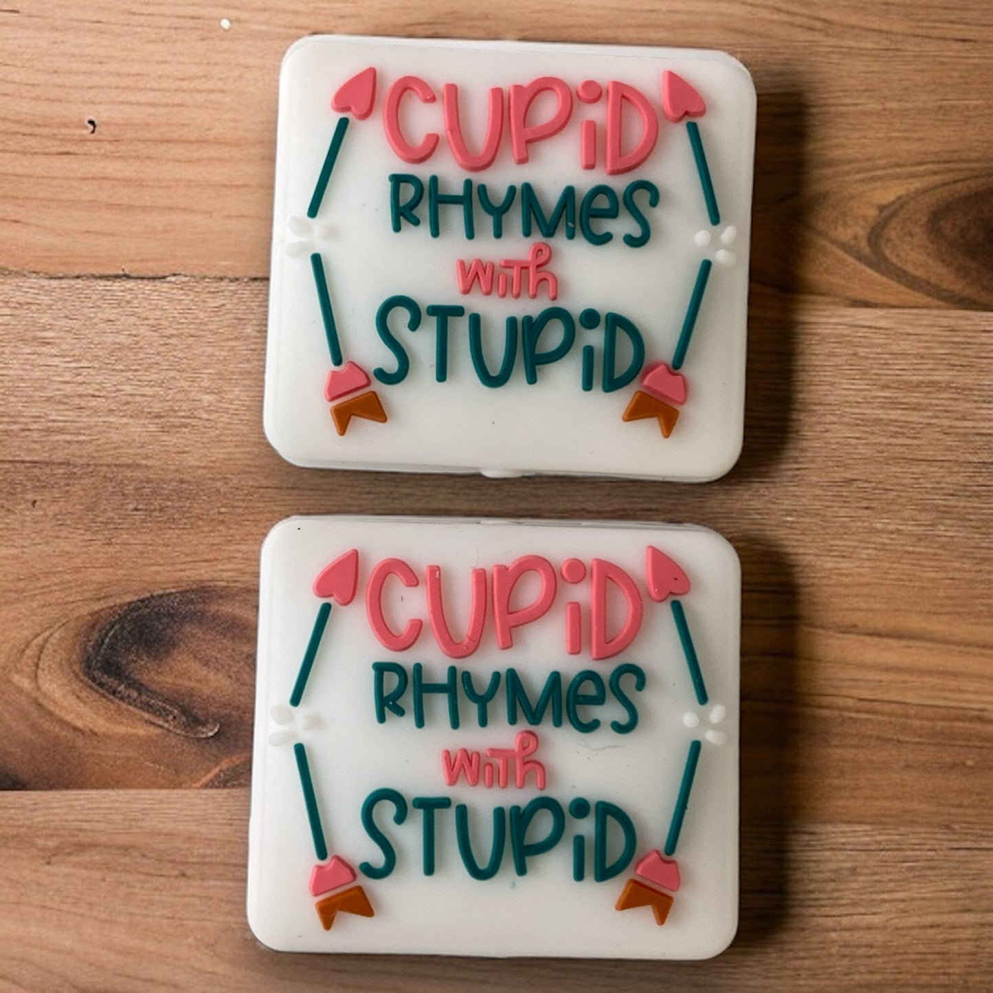 T203- "Cupid Rhymes With Stupid" Silicone (1 Count) Focal Bead