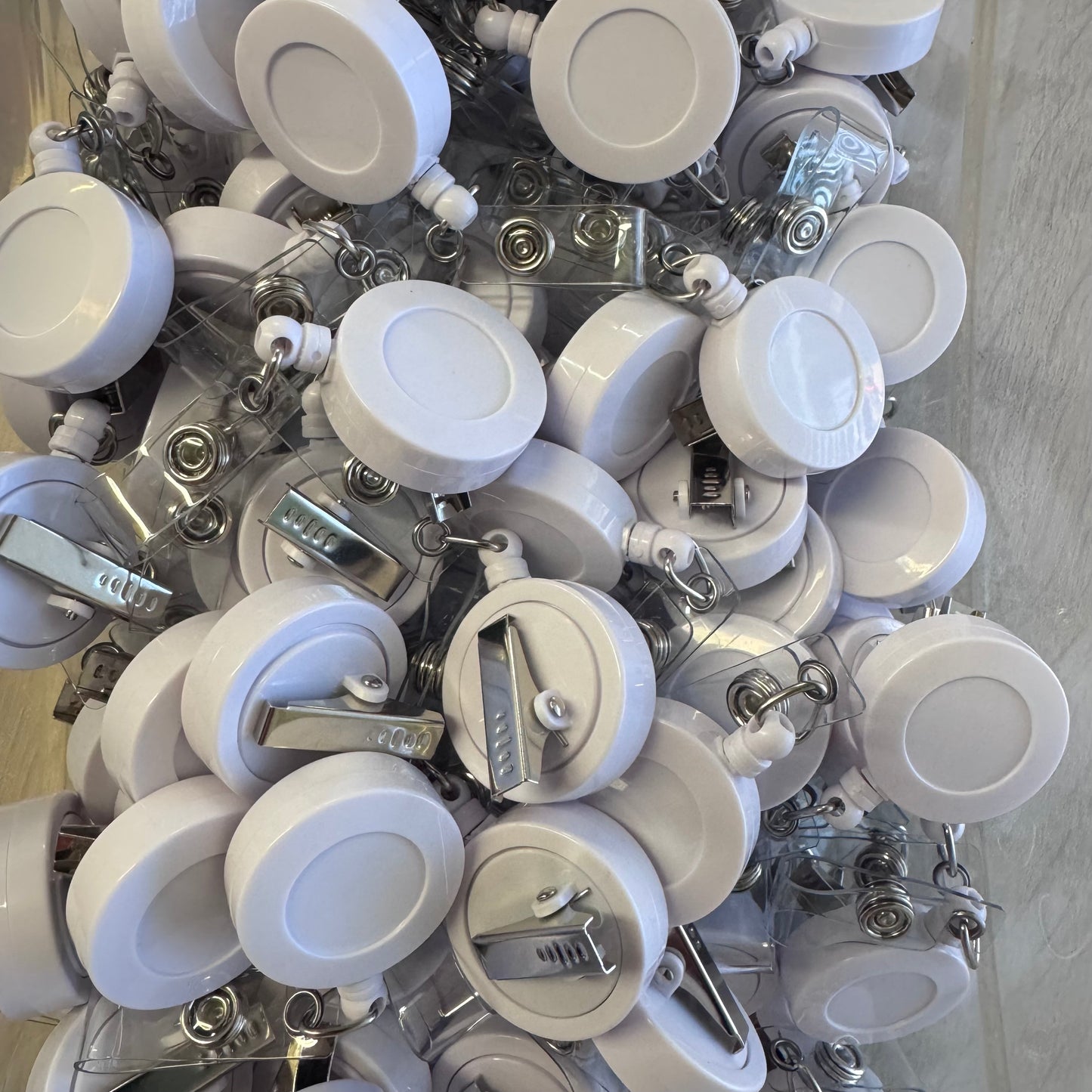 FX-9087-White Badge Reels (100 Count)