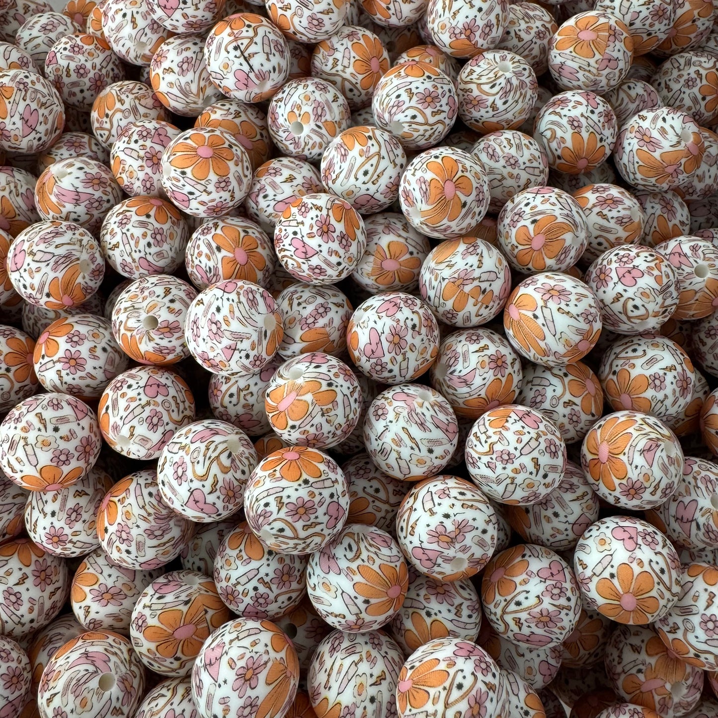 T413- 15mm "Medical / Floral" Pattern Silicone Beads