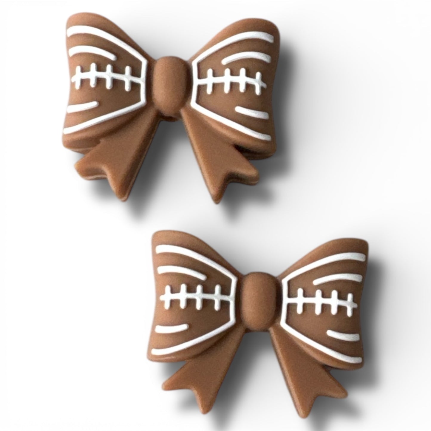X037-  “Football Bow” Silicone Focal Bead (1 Count)
