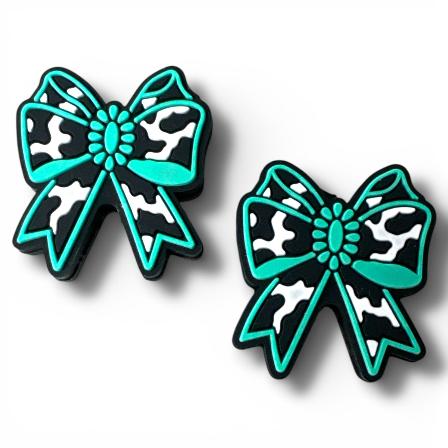 X034-  “Cow Print Turquoise Bow” Silicone Focal Bead (1 Count)