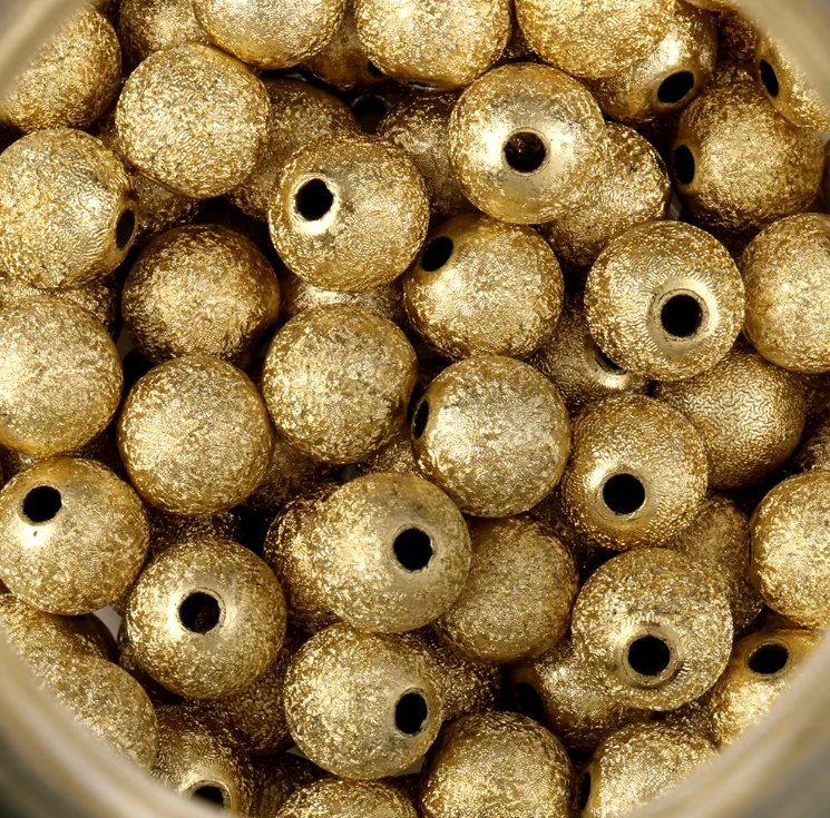 P95 - 4mm Gold Stardust Spacer (600 Pack)